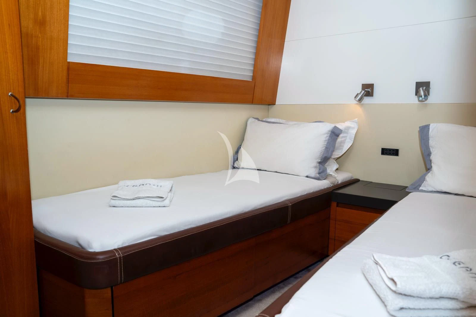 a couple of beds in a room aboard OCEAN DELTA 11 Yacht for Sale