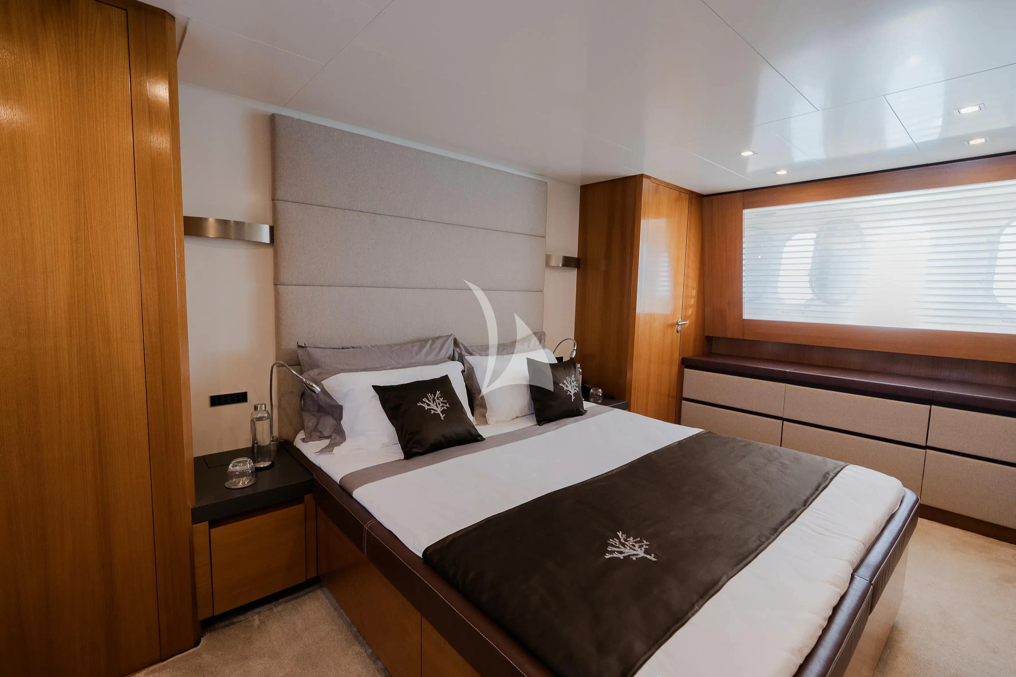 a bed with white sheets aboard OCEAN DELTA 11 Yacht for Sale