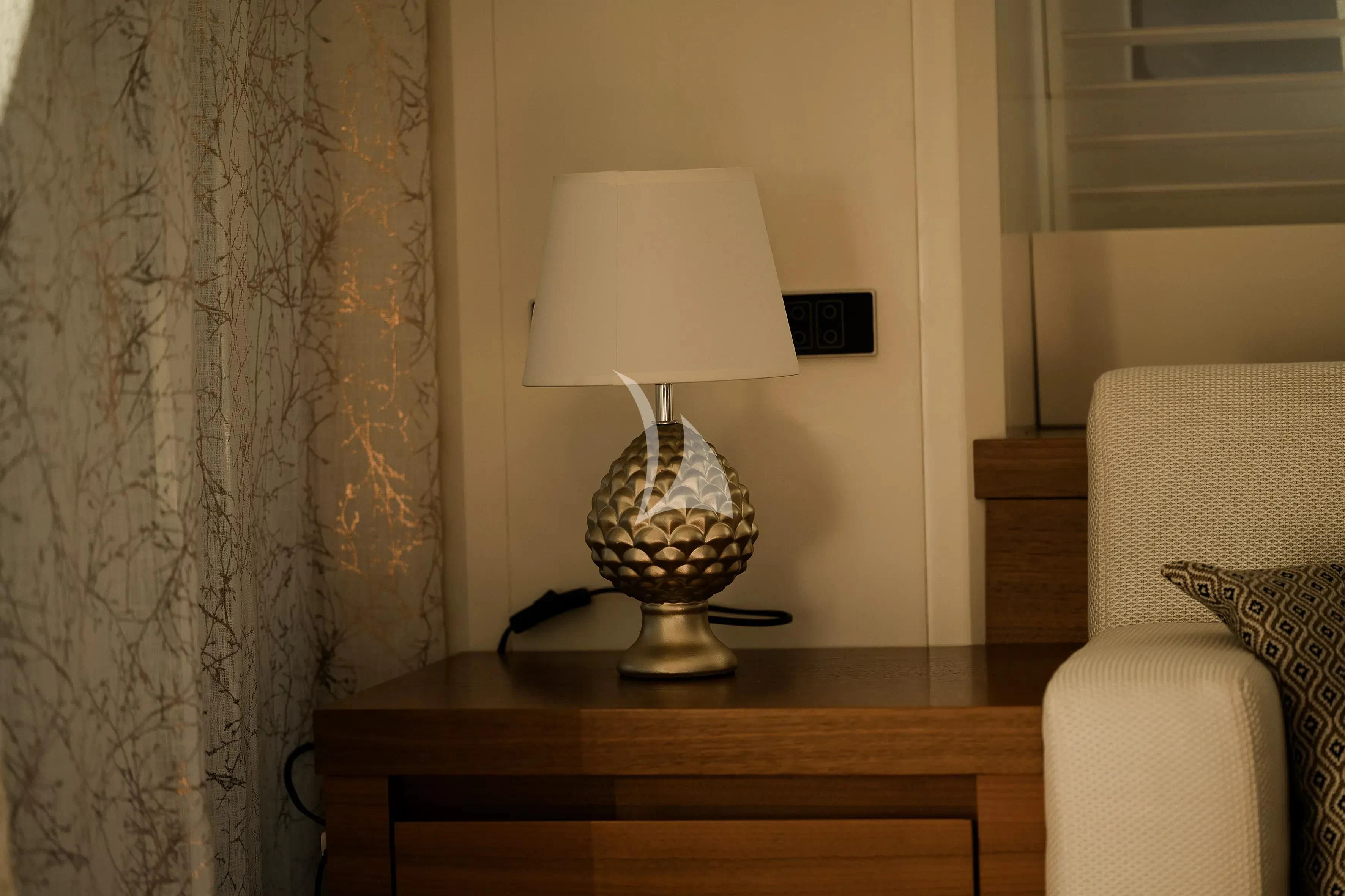 a lamp on a table aboard OCEAN DELTA 11 Yacht for Sale