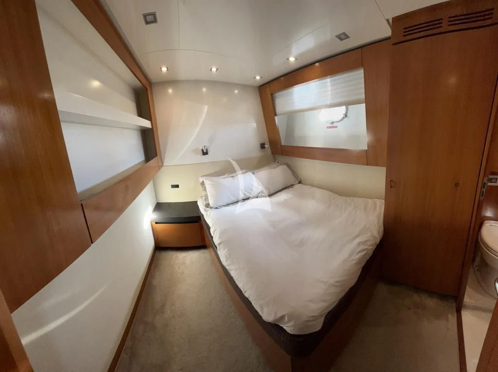 a bed in a room aboard OCEAN DELTA 11 Yacht for Sale