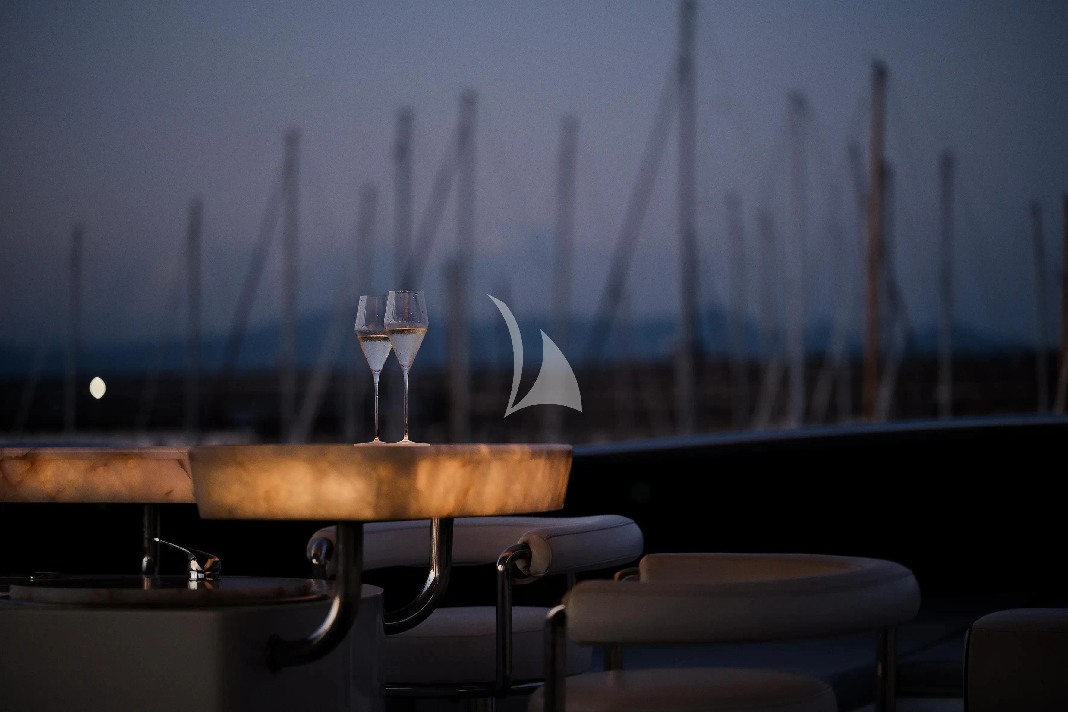 a glass of wine on a table aboard OCEAN DELTA 11 Yacht for Sale