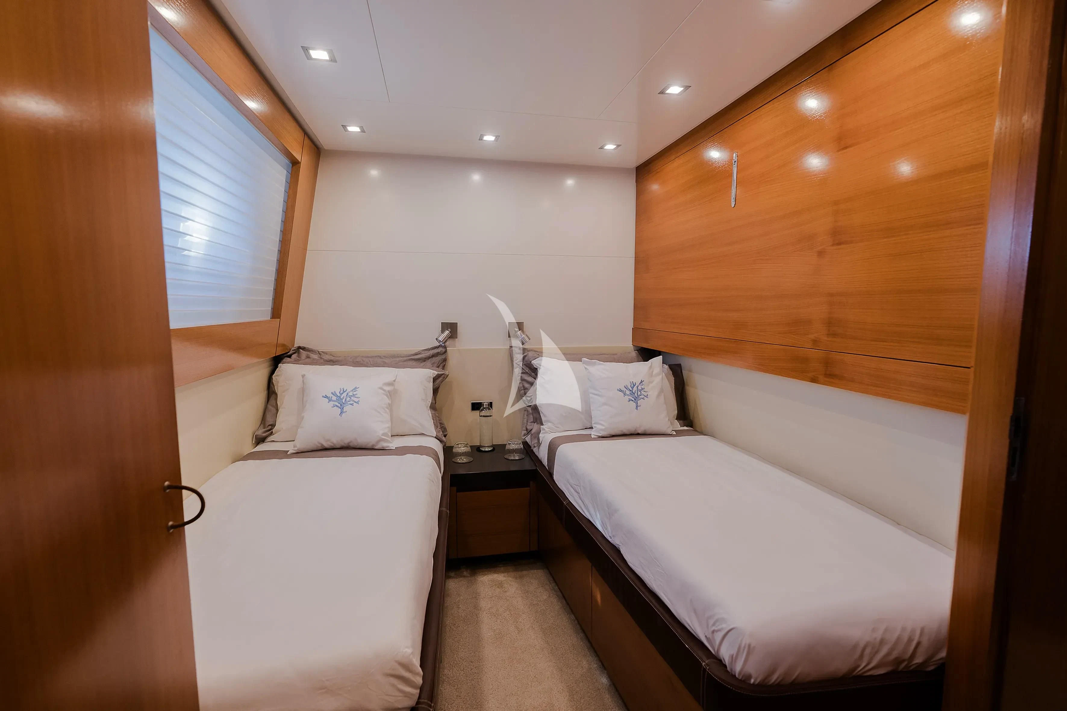 a room with two beds aboard OCEAN DELTA 11 Yacht for Sale