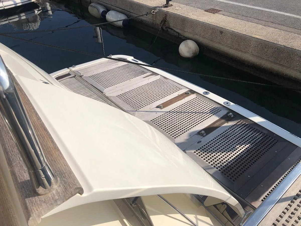 a close-up of a white guitar aboard OCEAN DELTA 11 Yacht for Sale