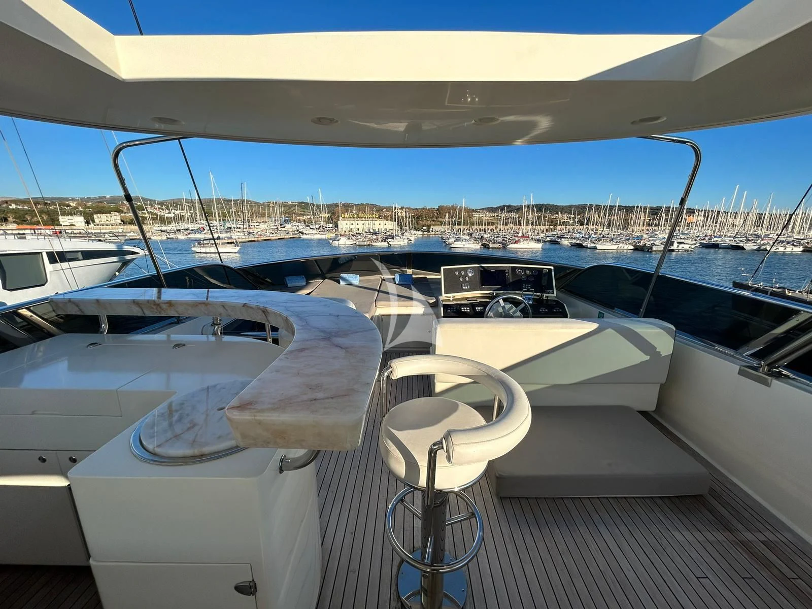 a deck with a view of a city and water aboard OCEAN DELTA 11 Yacht for Sale