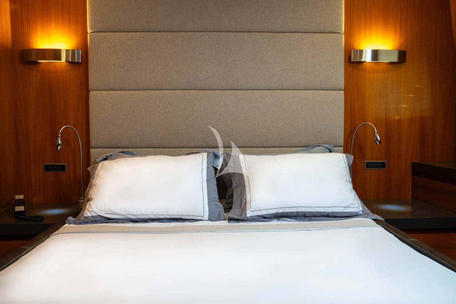 a bed with white sheets aboard OCEAN DELTA 11 Yacht for Sale