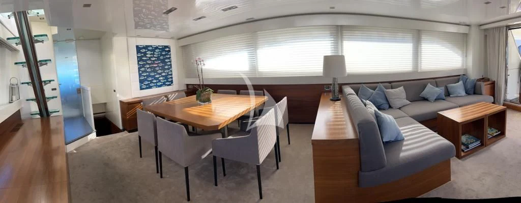 a living room with a couch and a table aboard OCEAN DELTA 11 Yacht for Sale