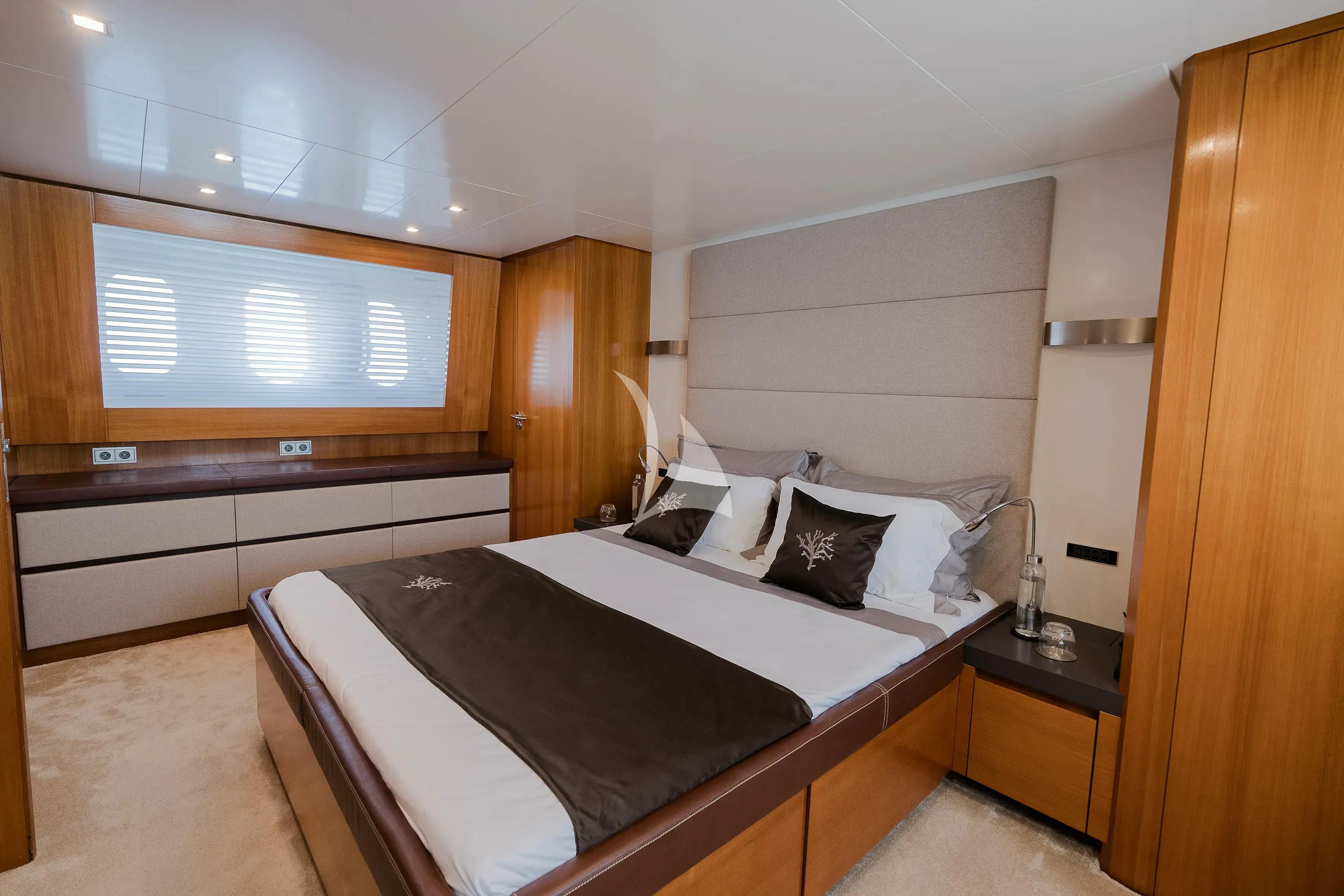 a bed in a room aboard OCEAN DELTA 11 Yacht for Sale