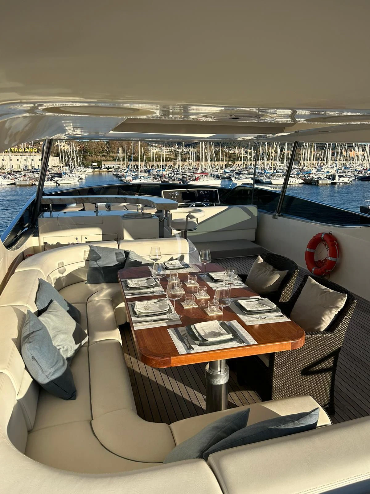 a table with a laptop on it aboard OCEAN DELTA 11 Yacht for Sale