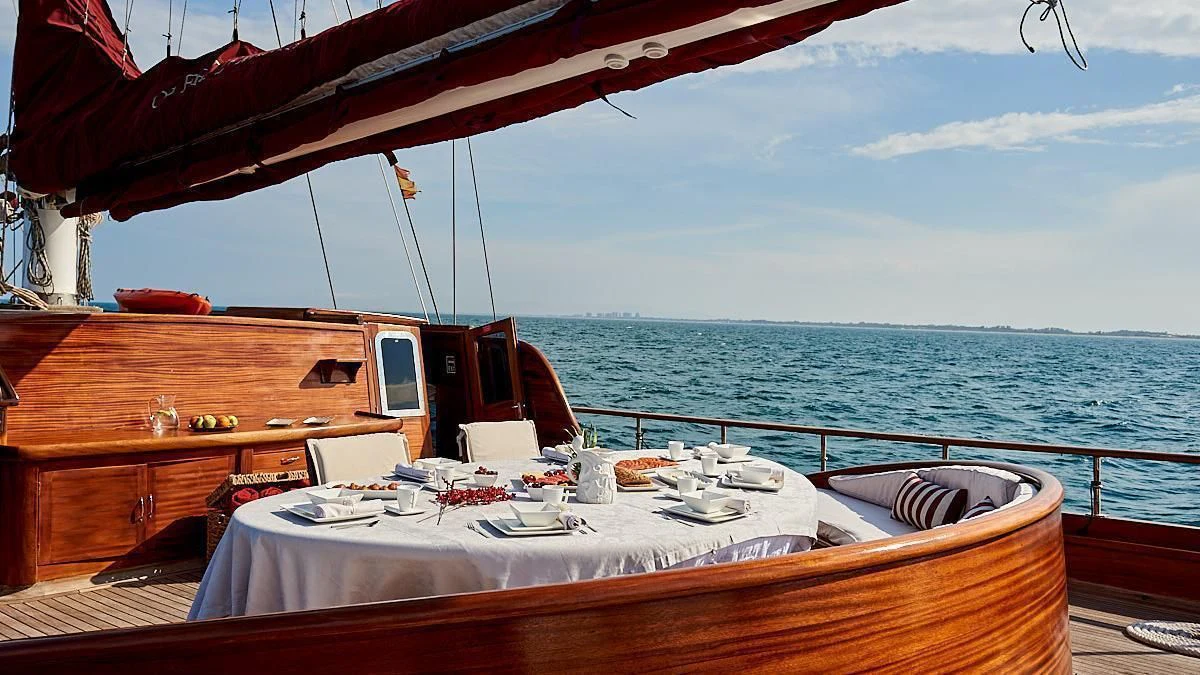 a table on a boat aboard QUEEN OF KARIA Yacht for Sale