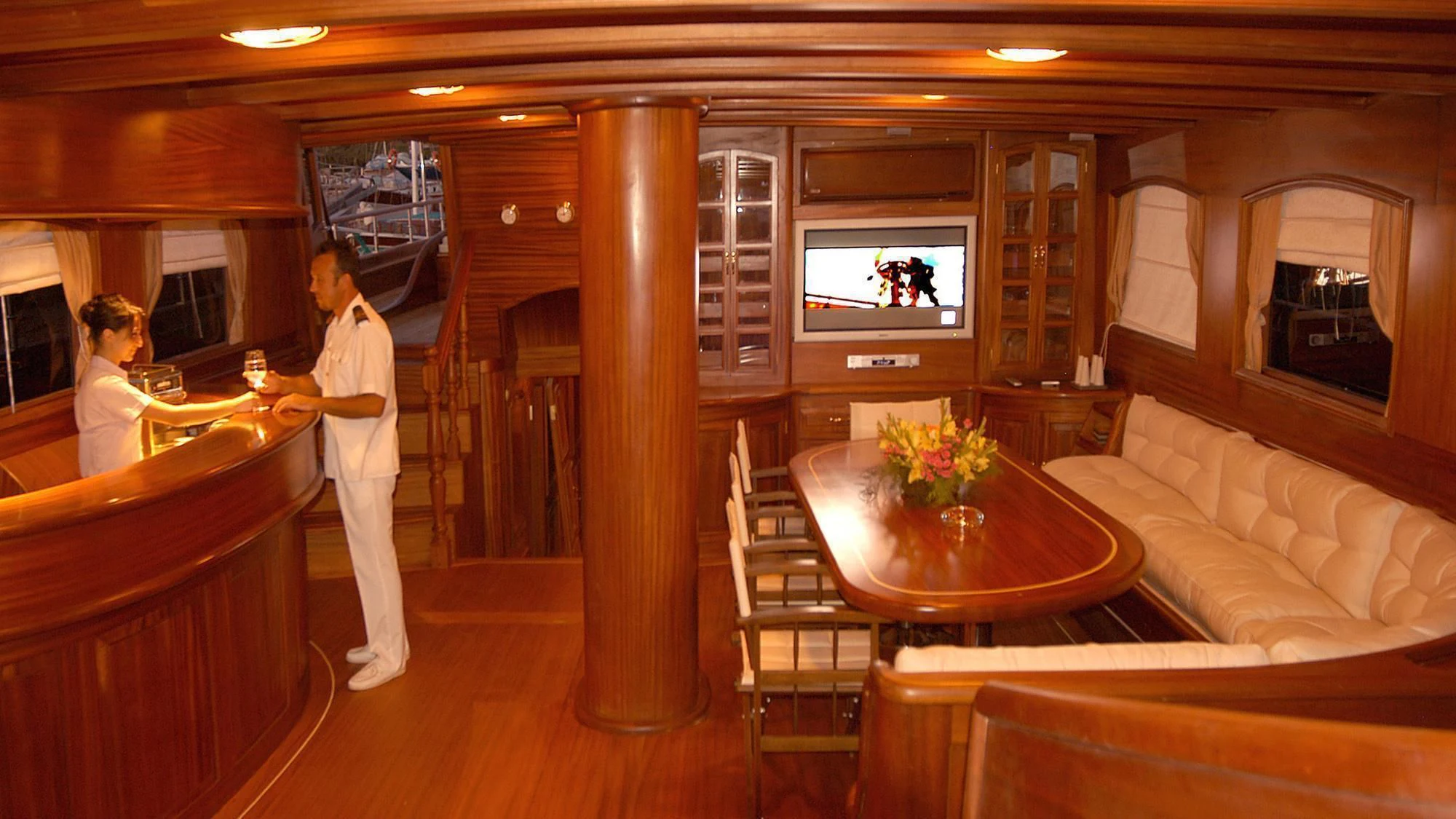 a couple of people in a room aboard QUEEN OF KARIA Yacht for Sale