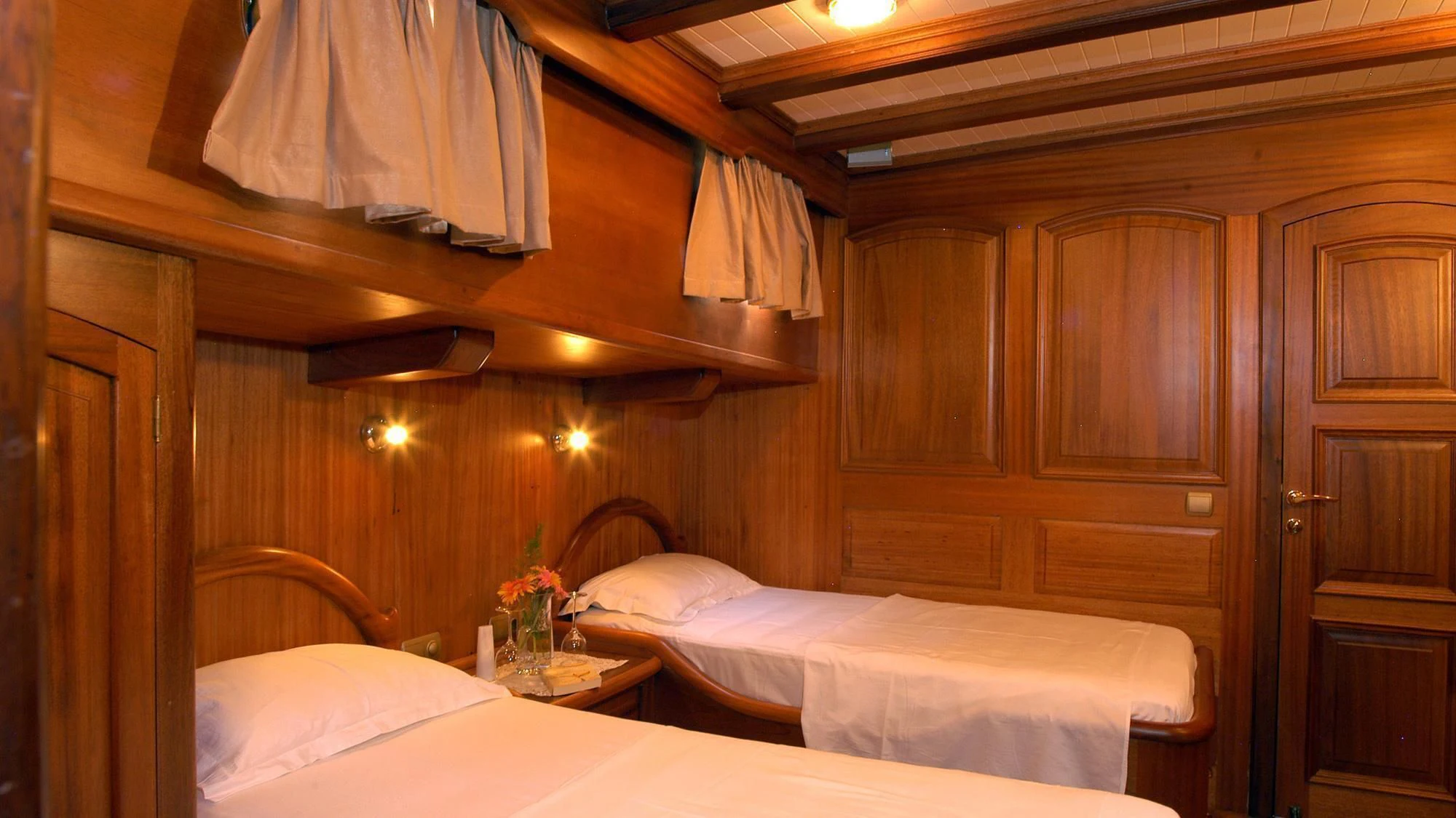 a room with two beds aboard QUEEN OF KARIA Yacht for Sale