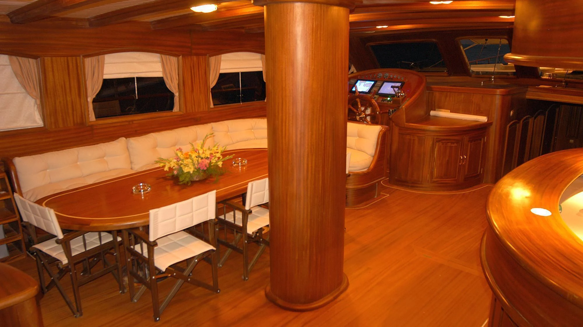 a large room with tables and chairs aboard QUEEN OF KARIA Yacht for Sale