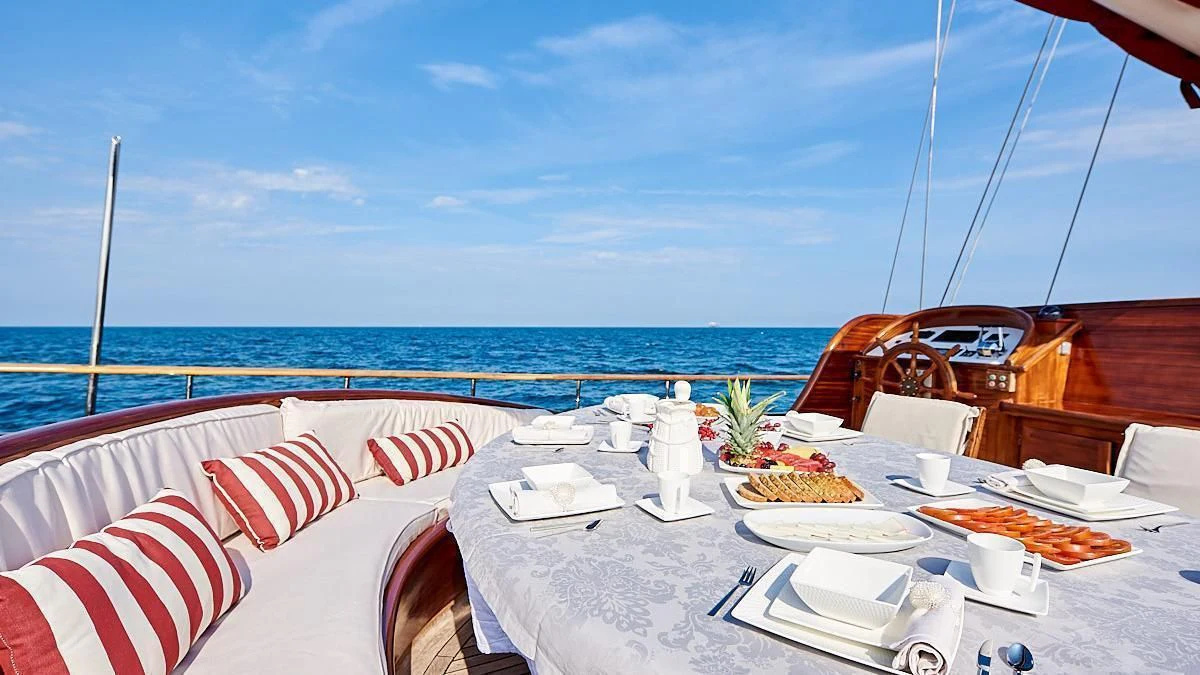 a table with food on it aboard QUEEN OF KARIA Yacht for Sale