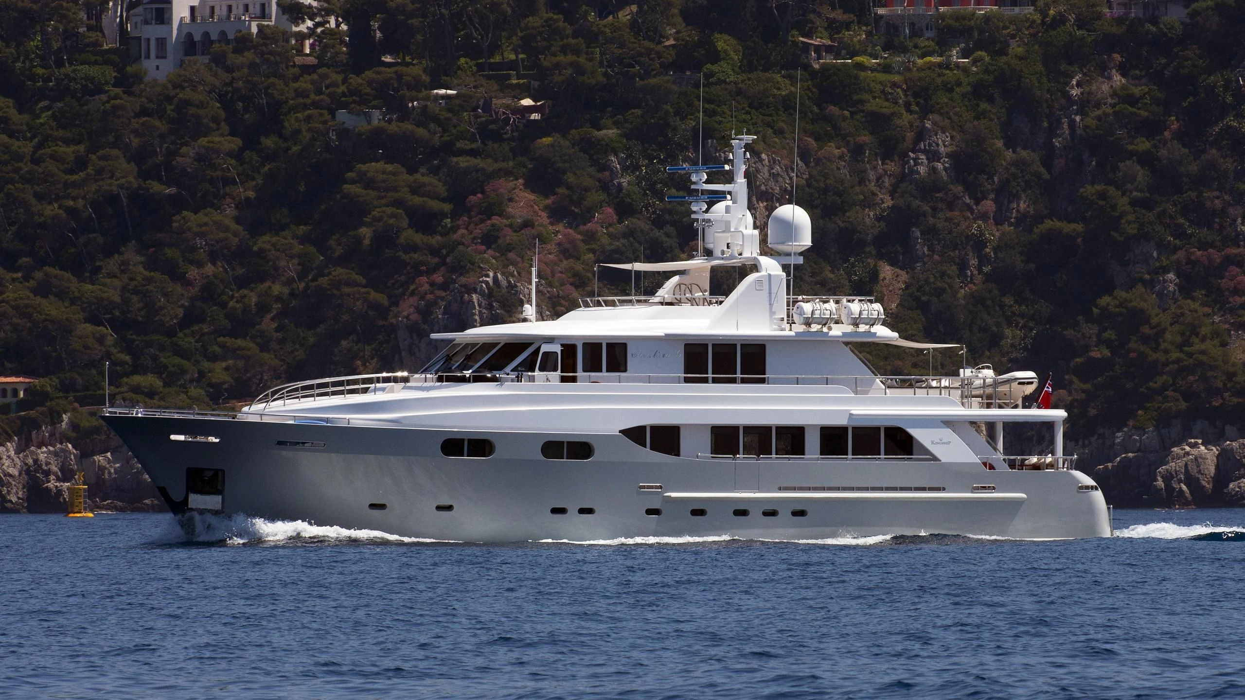 a large white boat on the water aboard CHRISTINA G Yacht for Charter