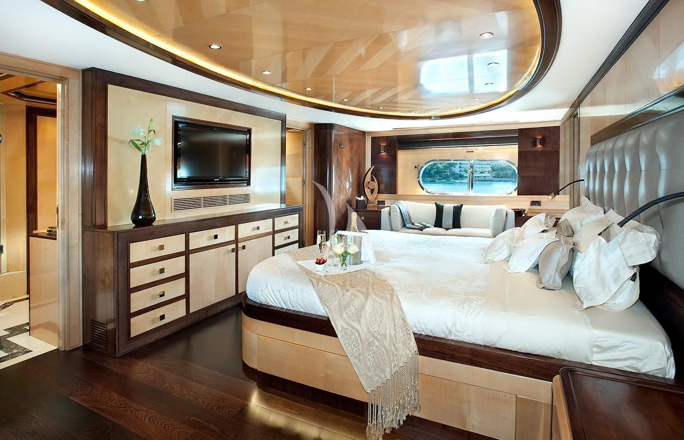 a bed in a room aboard CHRISTINA G Yacht for Charter