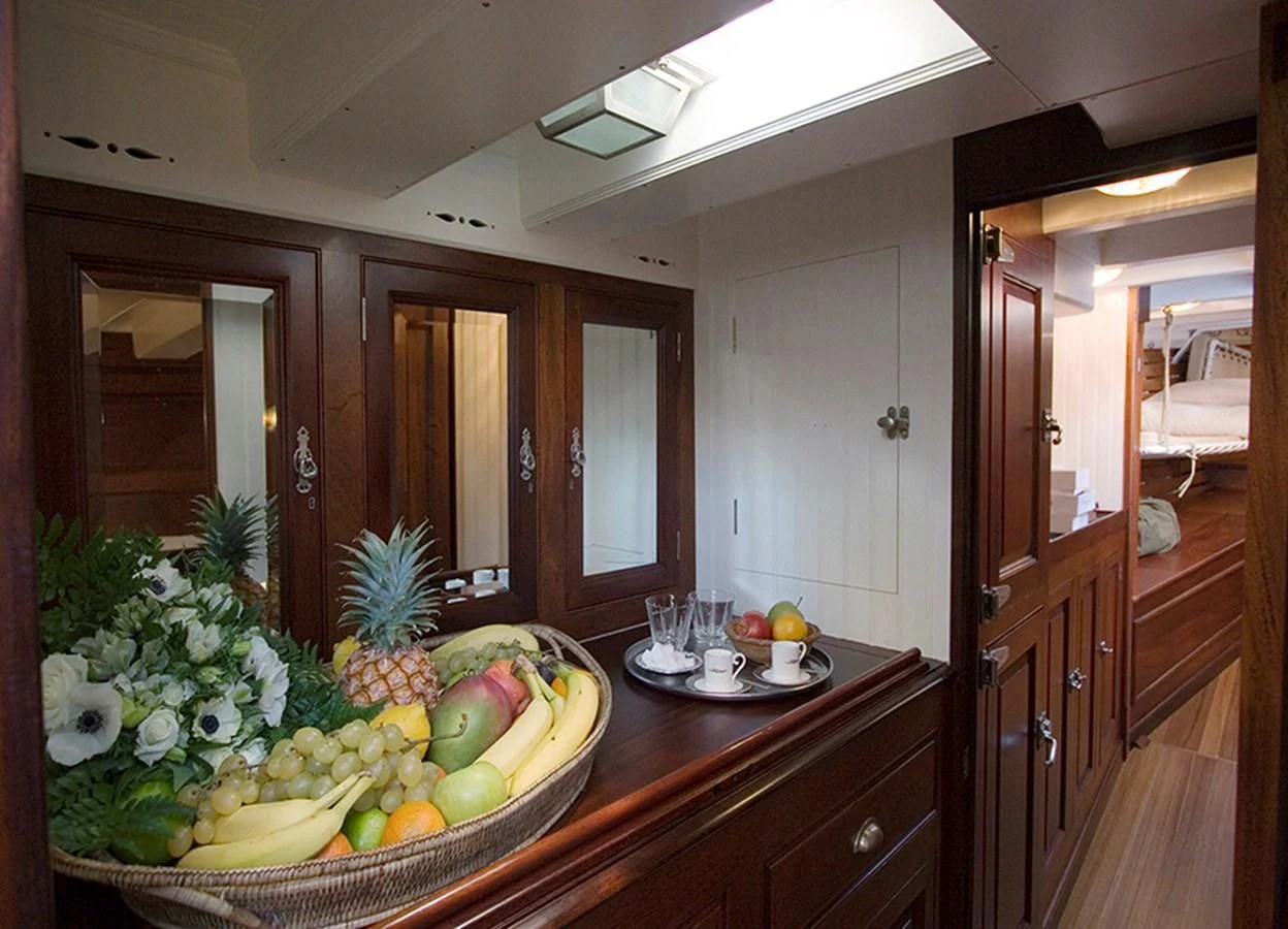 a bowl of fruit on a table aboard MOONBEAM OF FIFE III Yacht for Sale