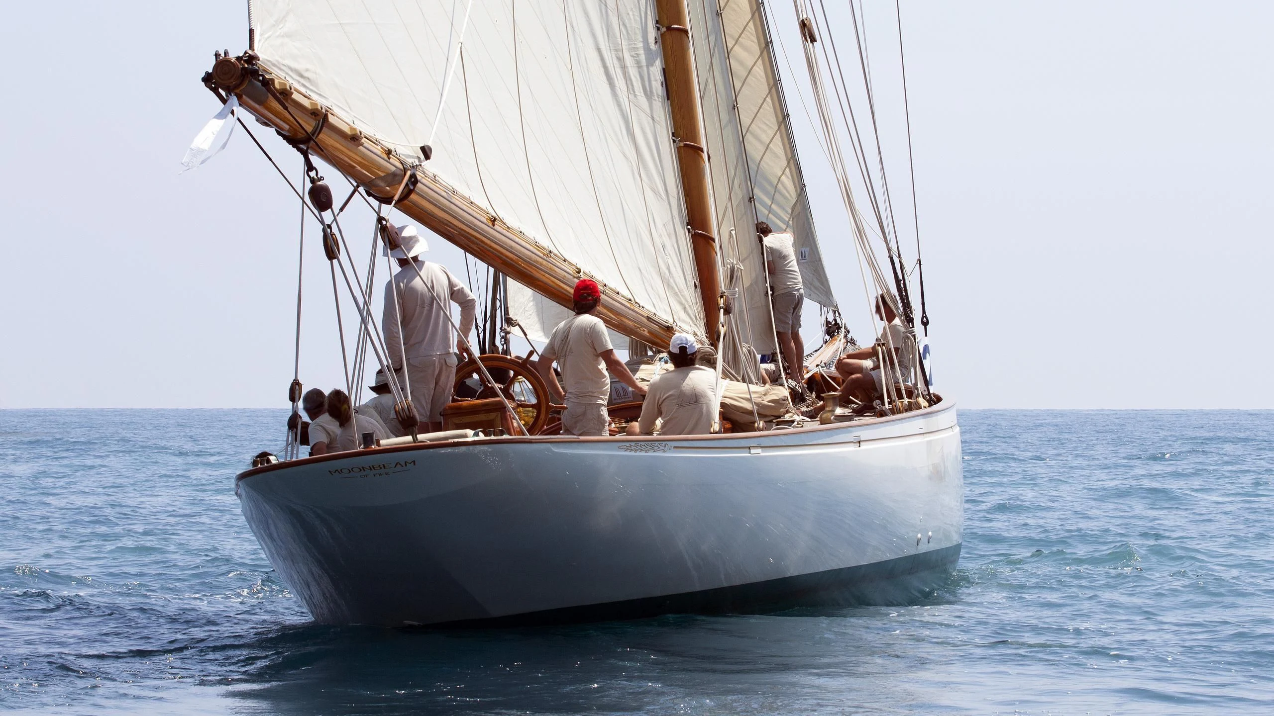a group of people on a sailboat aboard MOONBEAM OF FIFE III Yacht for Sale