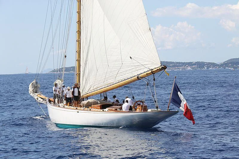 a sailboat with people on it aboard MOONBEAM OF FIFE III Yacht for Sale