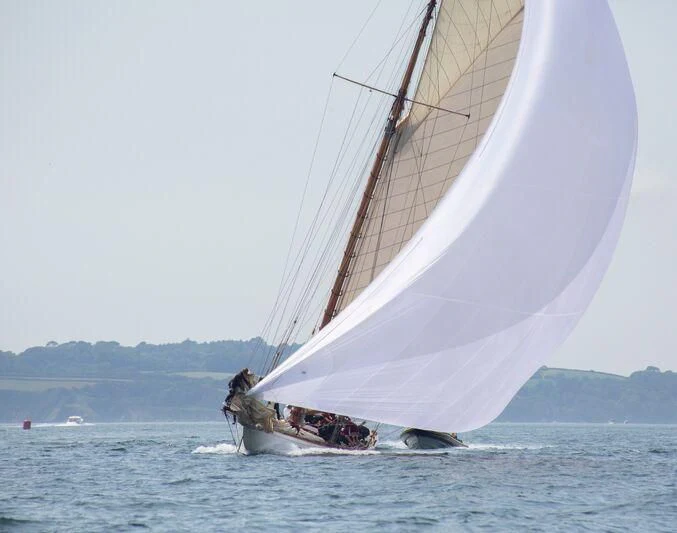a sailboat with people on it aboard MOONBEAM OF FIFE III Yacht for Sale