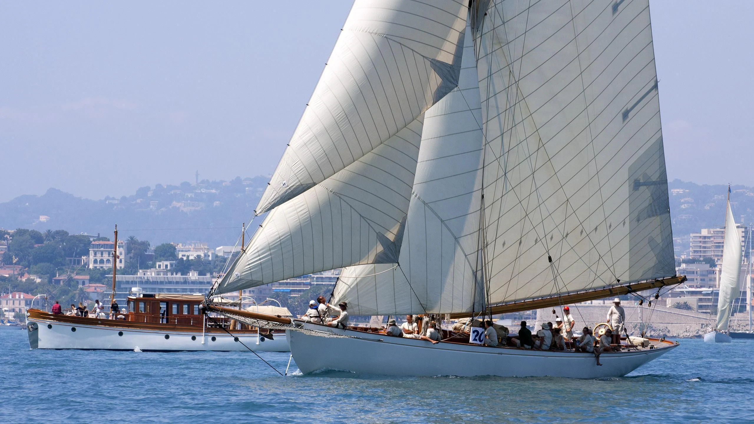 a group of people on a boat aboard MOONBEAM OF FIFE III Yacht for Sale