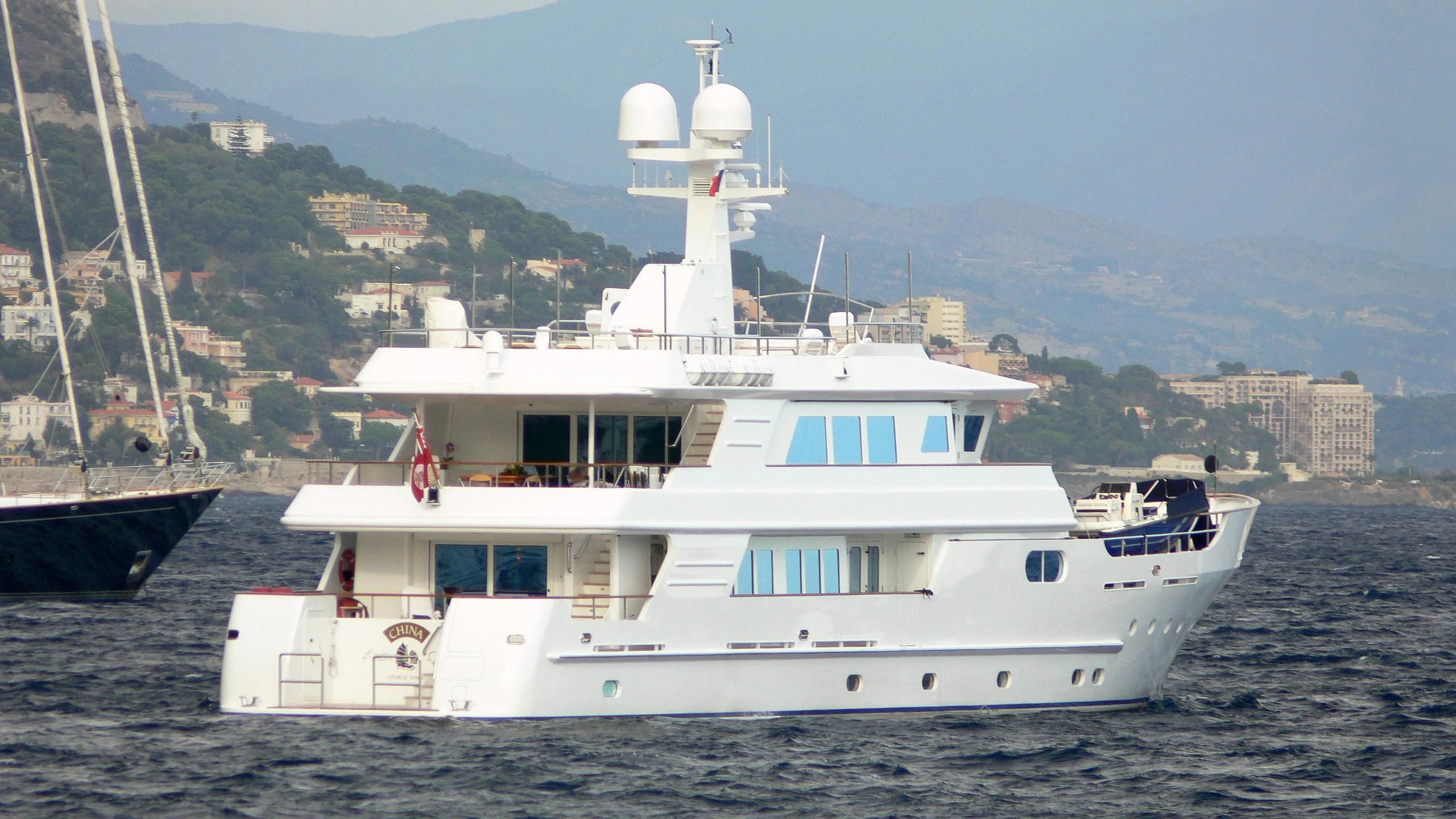 a large white boat in the water aboard RELENTLESS Yacht for Sale