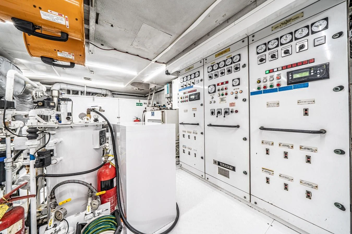 a room with white walls and white walls aboard RELENTLESS Yacht for Sale