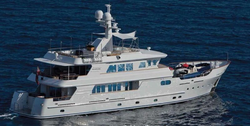 a white boat in the water aboard RELENTLESS Yacht for Sale