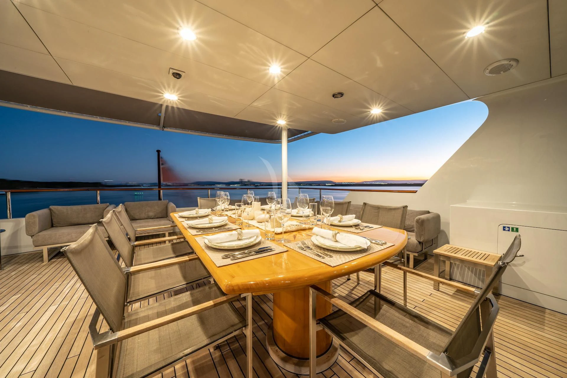 a room with a table and chairs aboard RELENTLESS Yacht for Sale