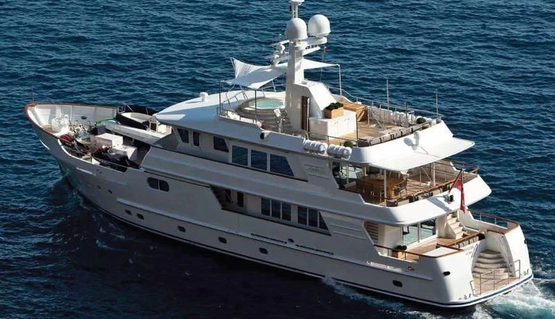 a large white ship in the water aboard RELENTLESS Yacht for Sale