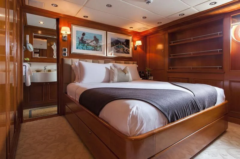 a bed in a room aboard RELENTLESS Yacht for Sale