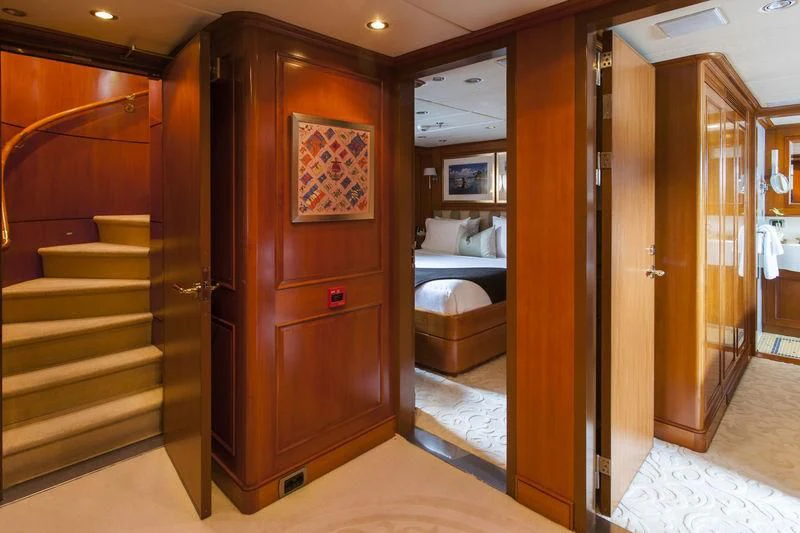 a room with wooden doors aboard RELENTLESS Yacht for Sale