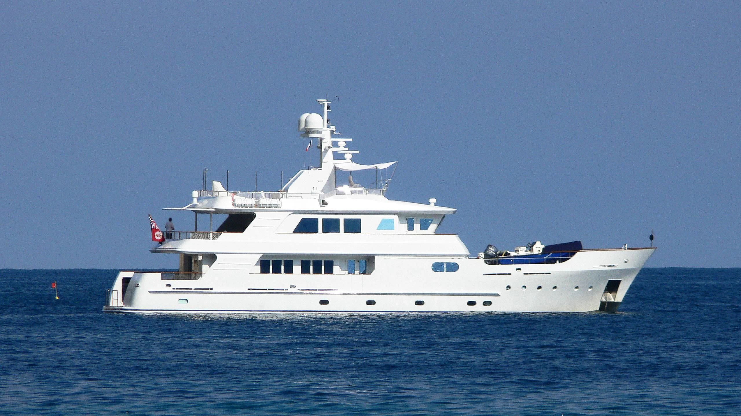 a white boat in the water aboard RELENTLESS Yacht for Sale