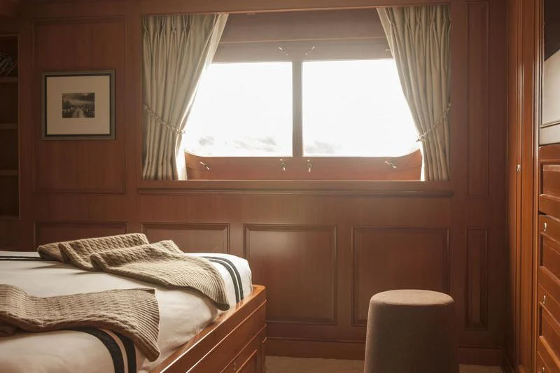 a bed in a room aboard RELENTLESS Yacht for Sale