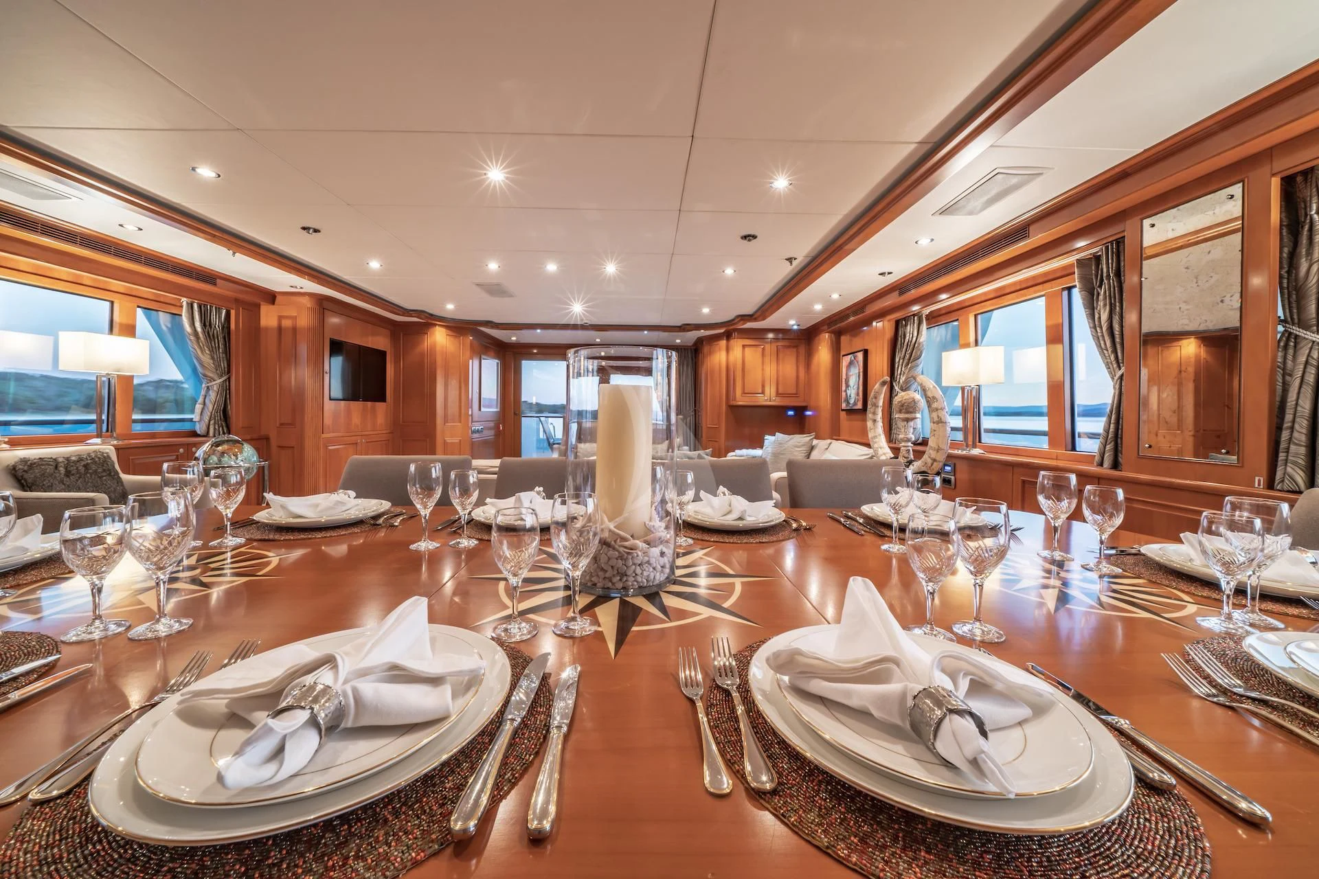 a table set with place settings aboard RELENTLESS Yacht for Sale