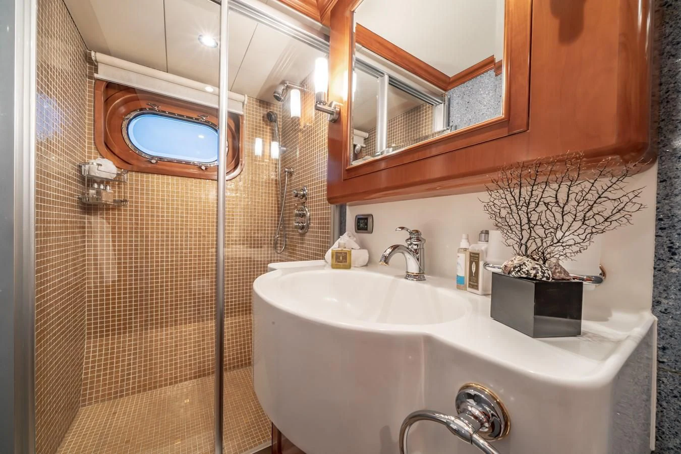 a bathroom with a sink and a shower aboard RELENTLESS Yacht for Sale