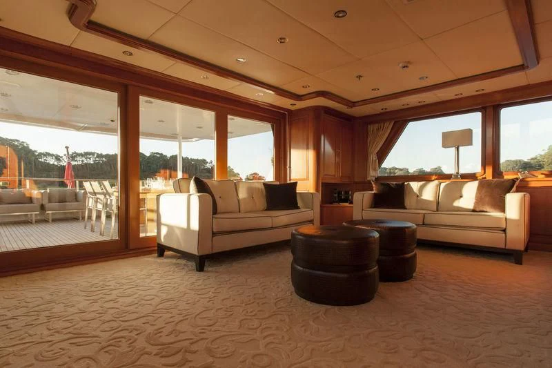 a living room with a large window aboard RELENTLESS Yacht for Sale