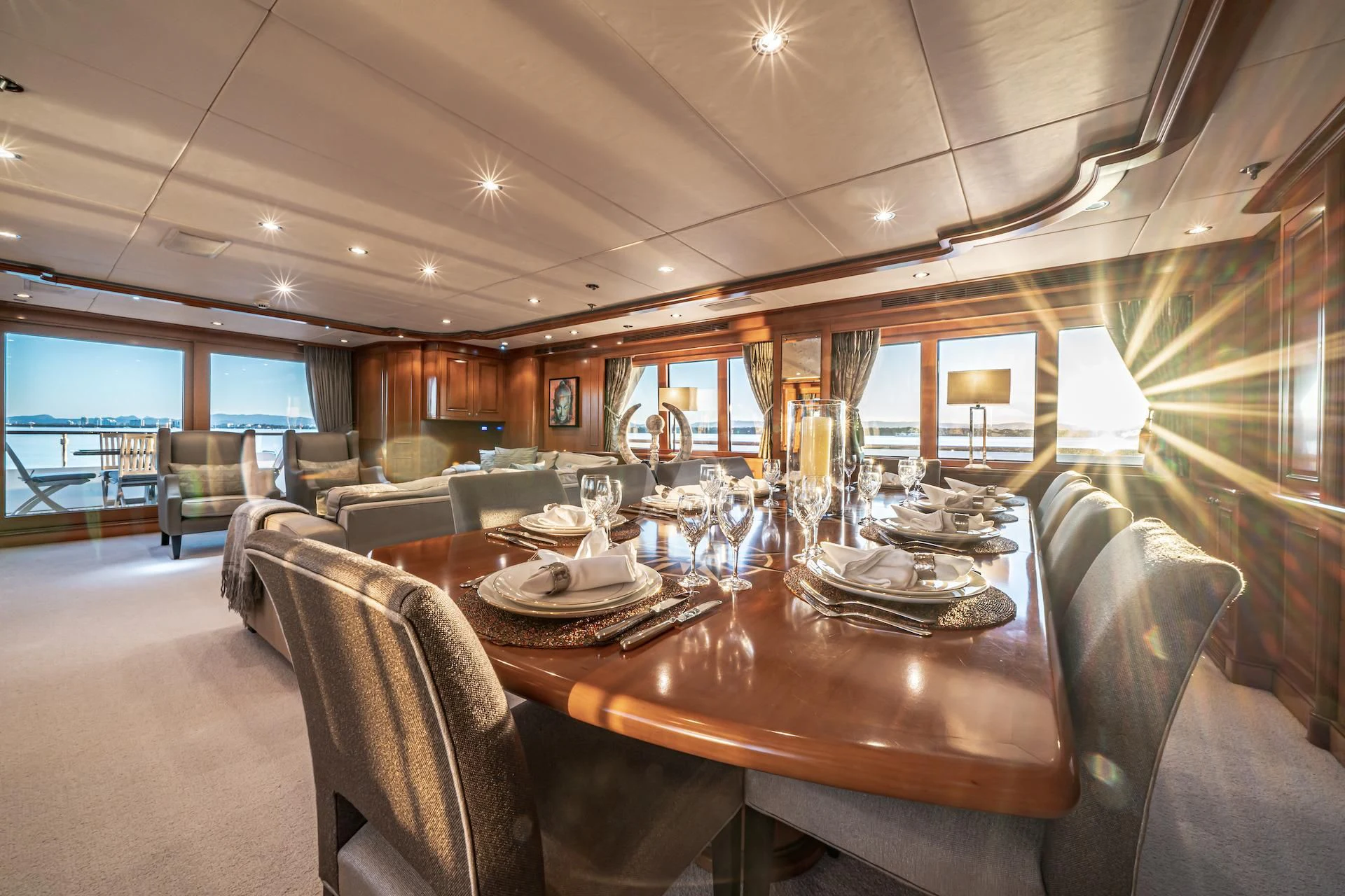 a dining room with a large window aboard RELENTLESS Yacht for Sale