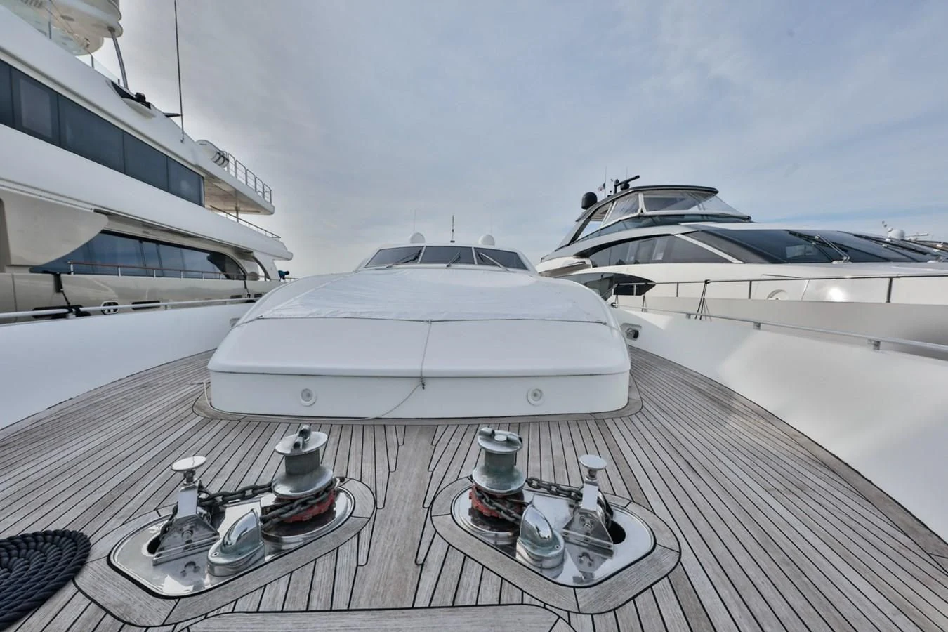 a white boat on a deck aboard NOTORIOUS Yacht for Sale