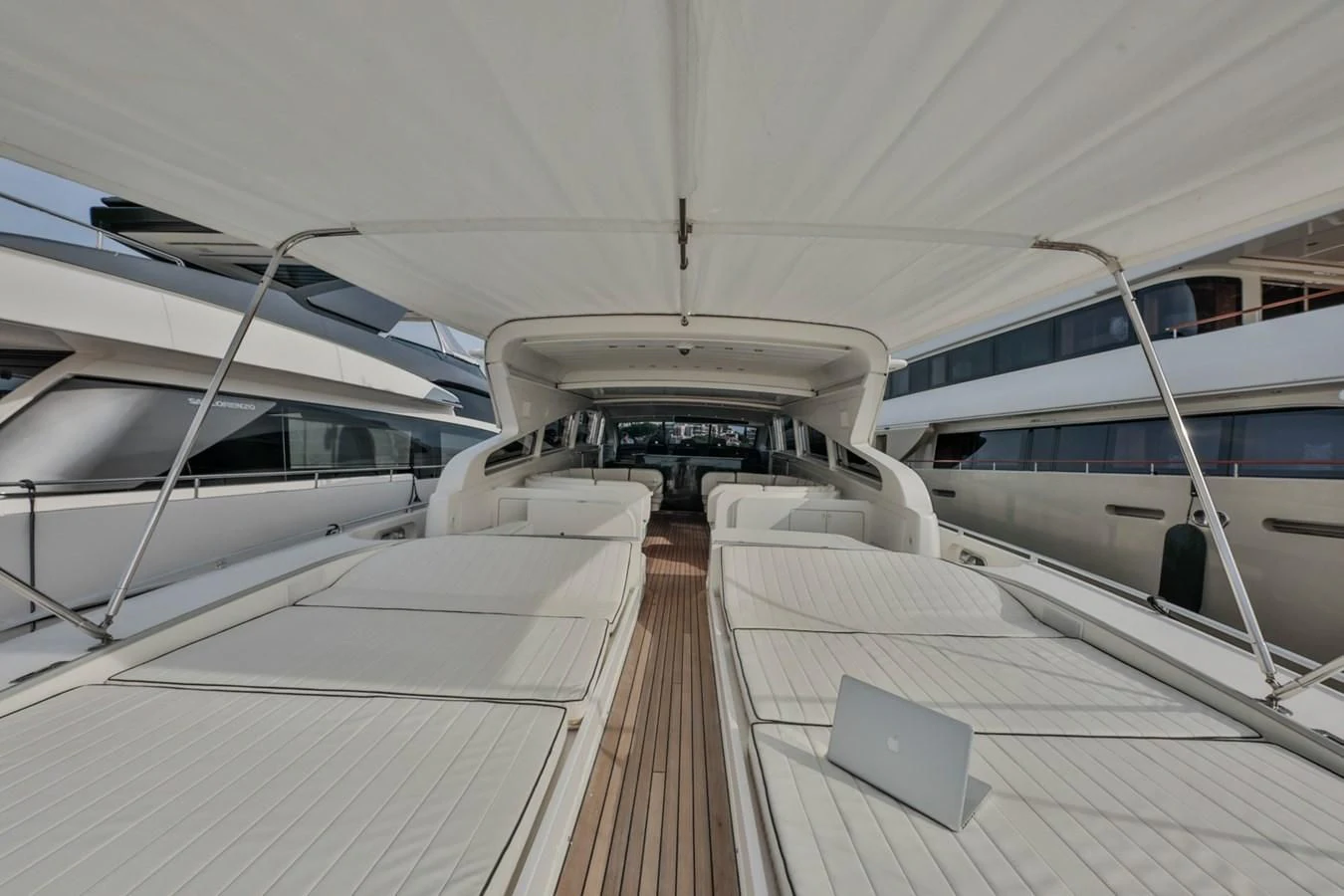 a white boat in a large building aboard NOTORIOUS Yacht for Sale