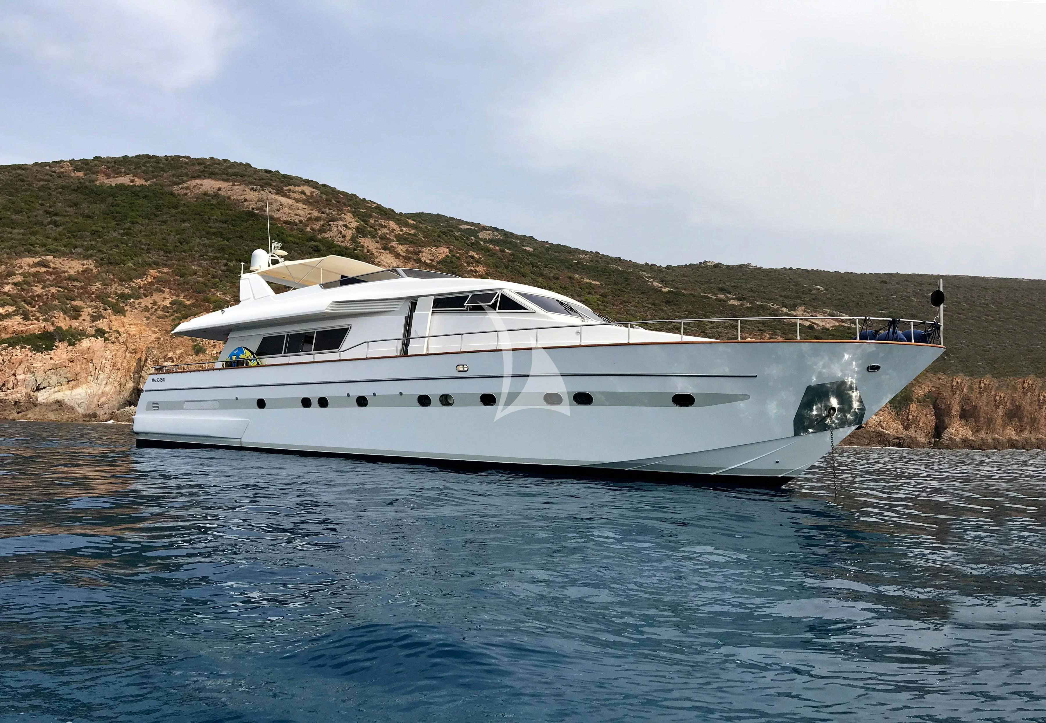 a white yacht in the water aboard OLA Yacht for Charter