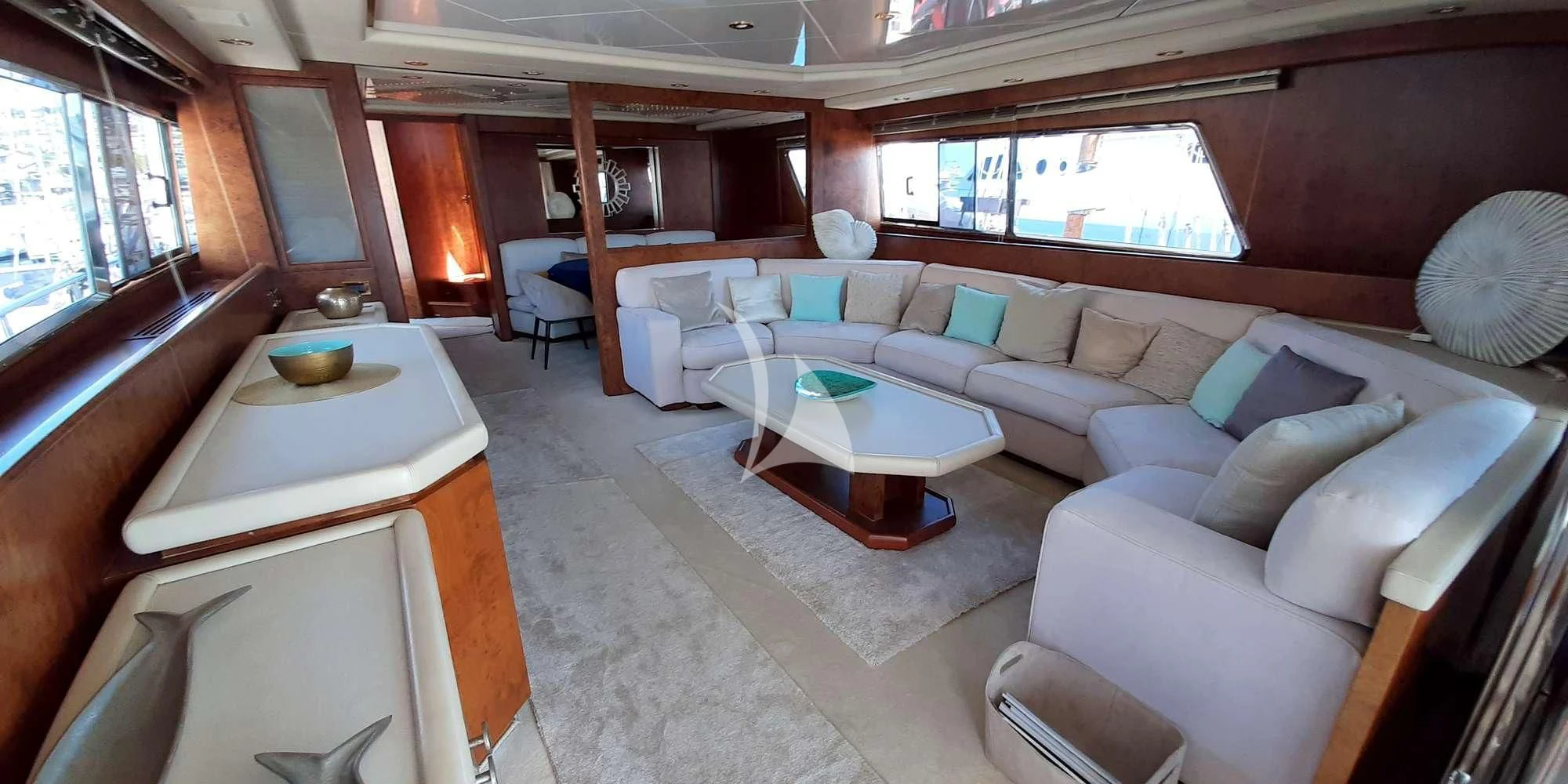 a room with a couch and a table aboard OLA Yacht for Charter