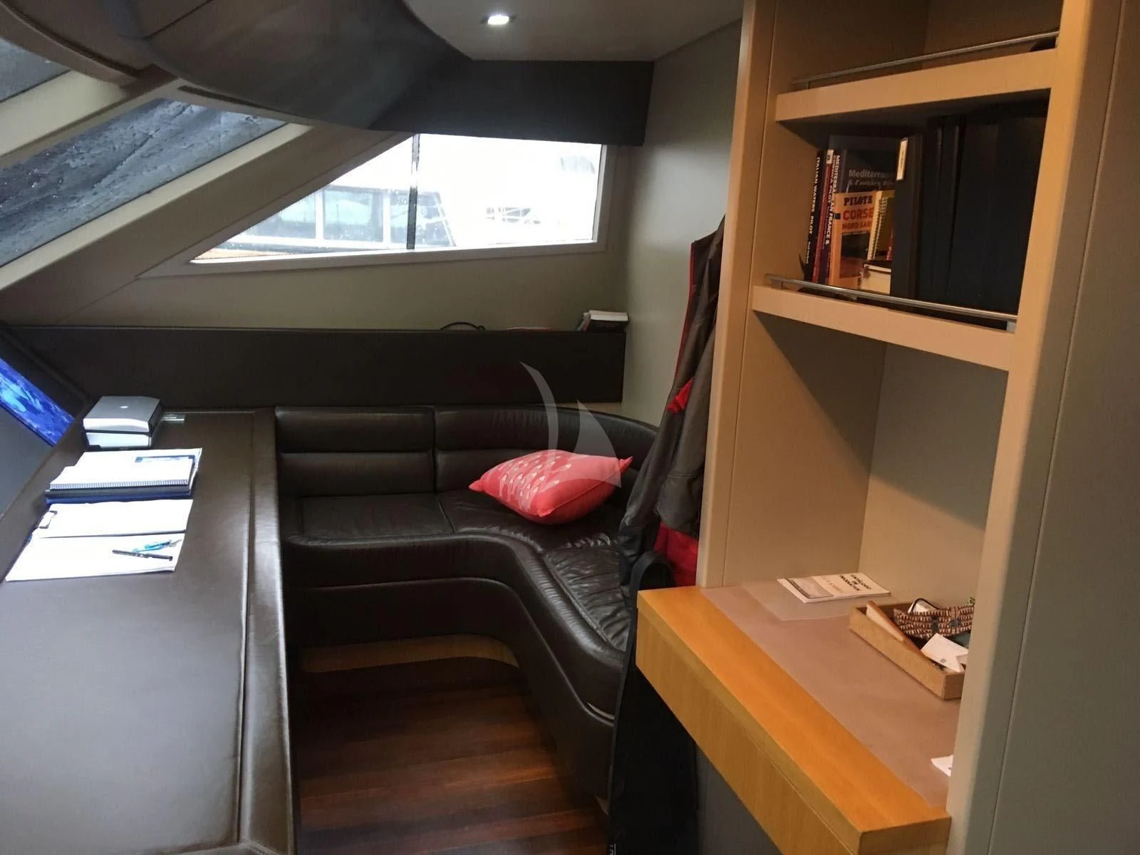a room with a couch and a desk aboard GOTA Yacht for Sale