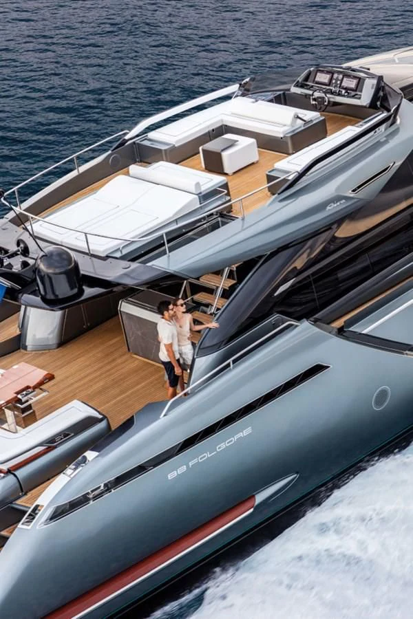 a couple of people on a boat aboard RIVA FOLGORE 88/24 Yacht for Sale