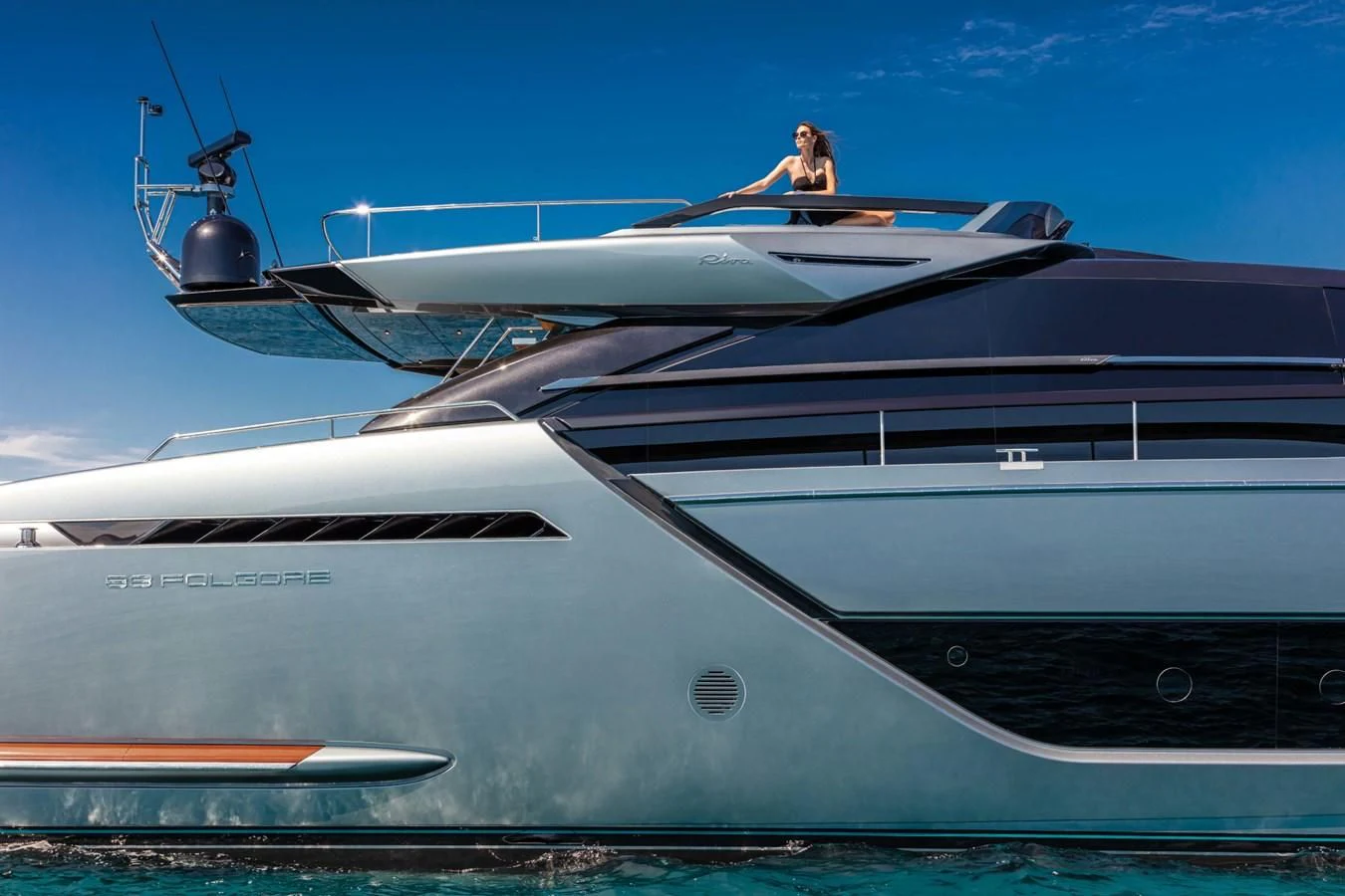 a person sitting on a yacht aboard RIVA FOLGORE 88/24 Yacht for Sale