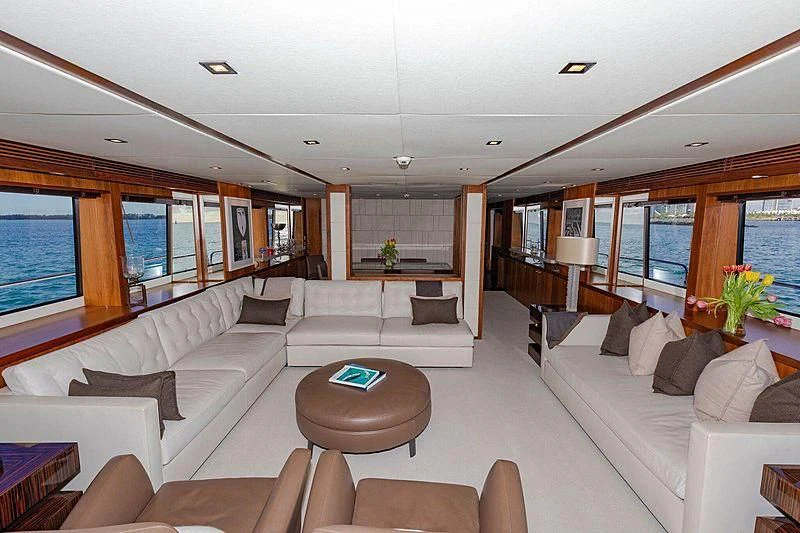 a living room with a large window aboard SEAHORSE Yacht for Sale
