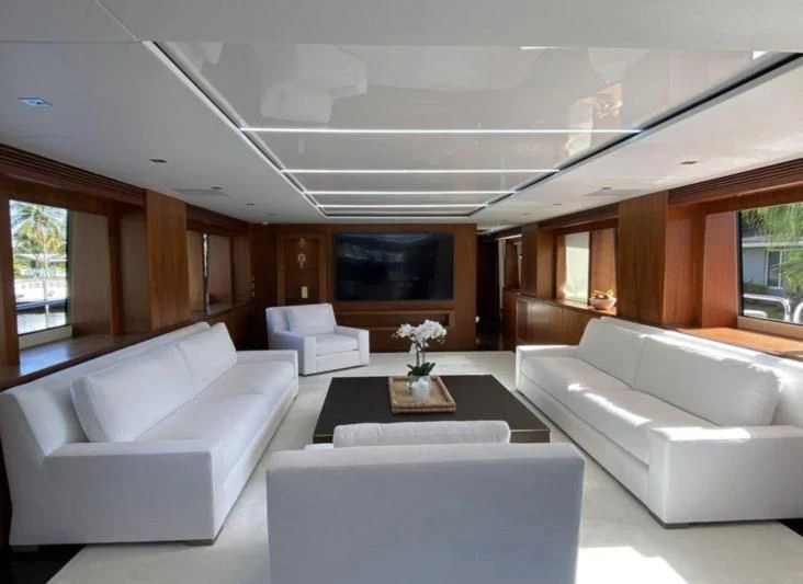 a living room with white couches aboard SEAHORSE Yacht for Sale