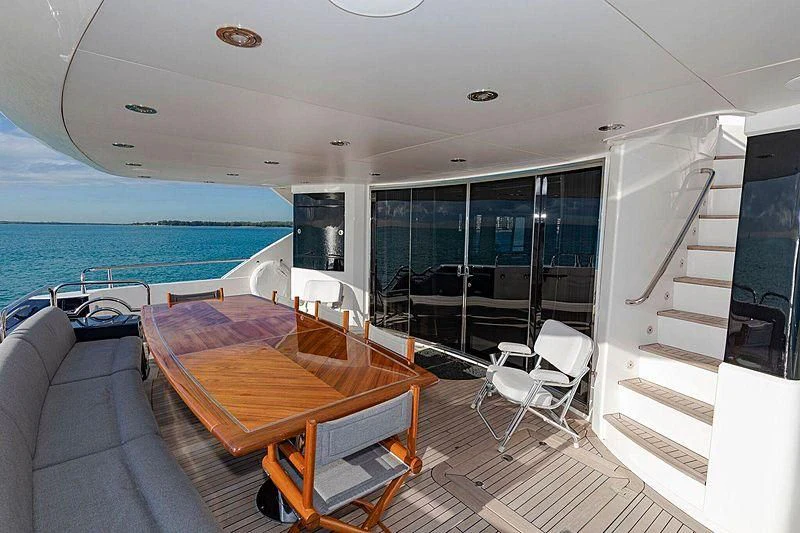 a room with a table and chairs aboard SEAHORSE Yacht for Sale