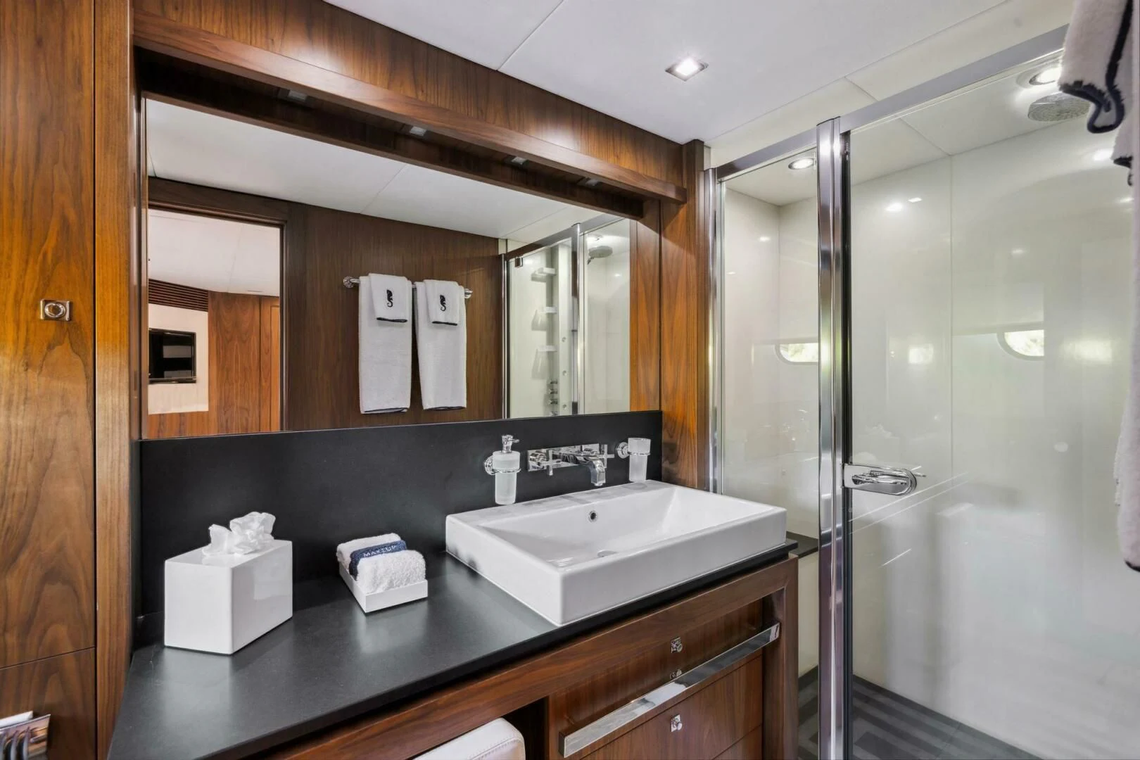 a bathroom with a large mirror aboard SEAHORSE Yacht for Sale