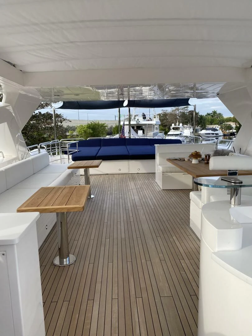 a room with a pool and a deck with a deck and a deck aboard SEAHORSE Yacht for Sale