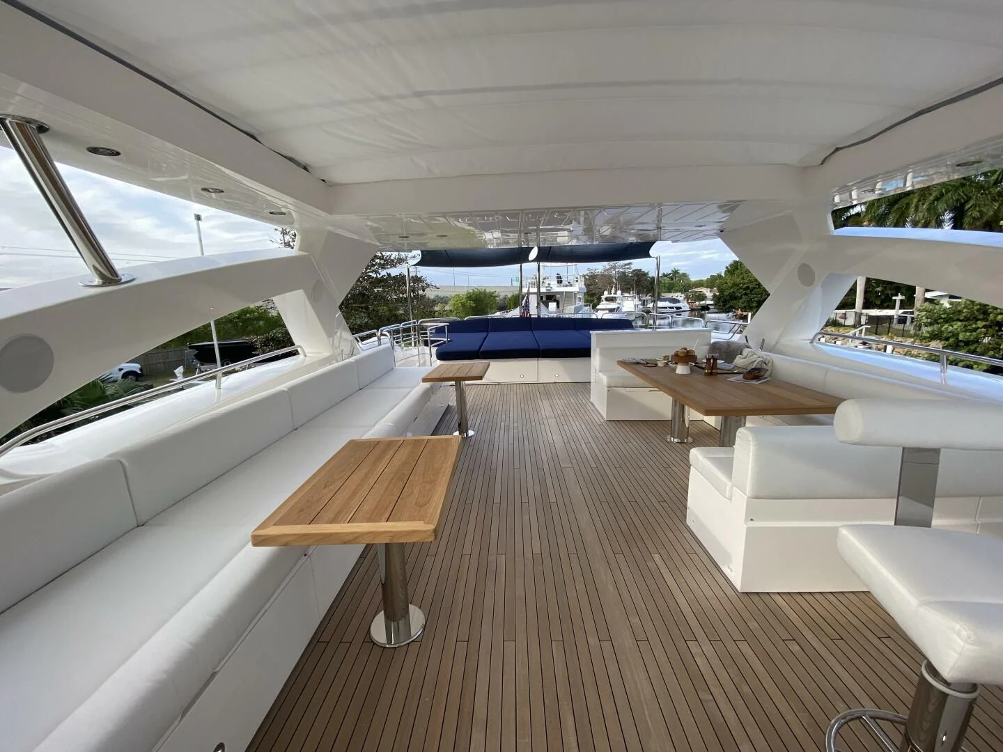 a room with a wood floor and white walls and a wood bench aboard SEAHORSE Yacht for Sale
